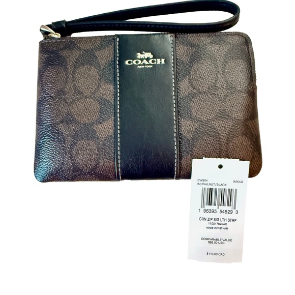 Coach Handbags - Coach Black and Gold Wristlet